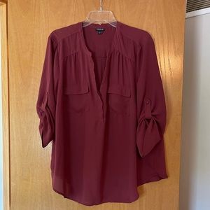 Burgundy three quarter sleeve blouse.